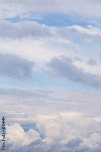 Fototapeta Naklejka Na Ścianę i Meble -  Abstract background texture. Beautiful soft blue sky with white fluffy clouds