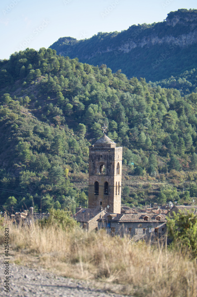 views of the bell tower of the church of the town of Ainsa, in the Aragonese Pyrenees, located in Huesca, Spain