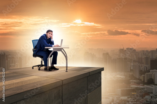 Businessman self isolating on the top