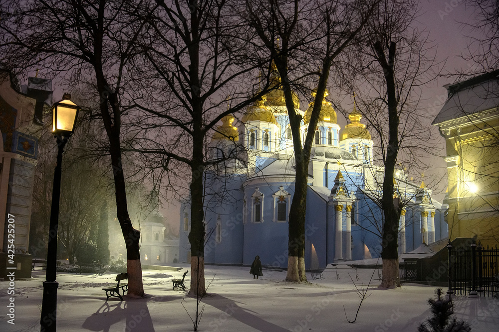 Evening winter view to St. Michael's Golden Domed Monastery Cathedral in Kyiv, Ukraine. March 2021