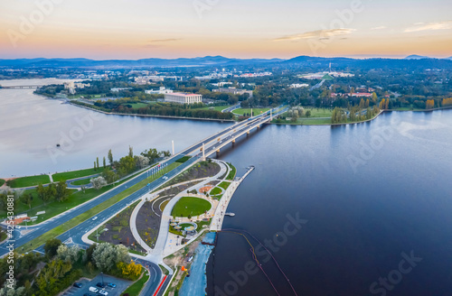 Aerial view of Commonwealth Bridge on Lake Burley Griffin in the late afternoon in Canberra, the capital of Australia  © Steve