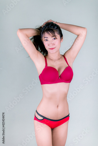 Beauty sexy slim woman body showing red bikini her perfect © releon8211