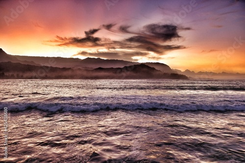 A dramatic sunset frames the Hanalei Bay on Kauai in Hawaii