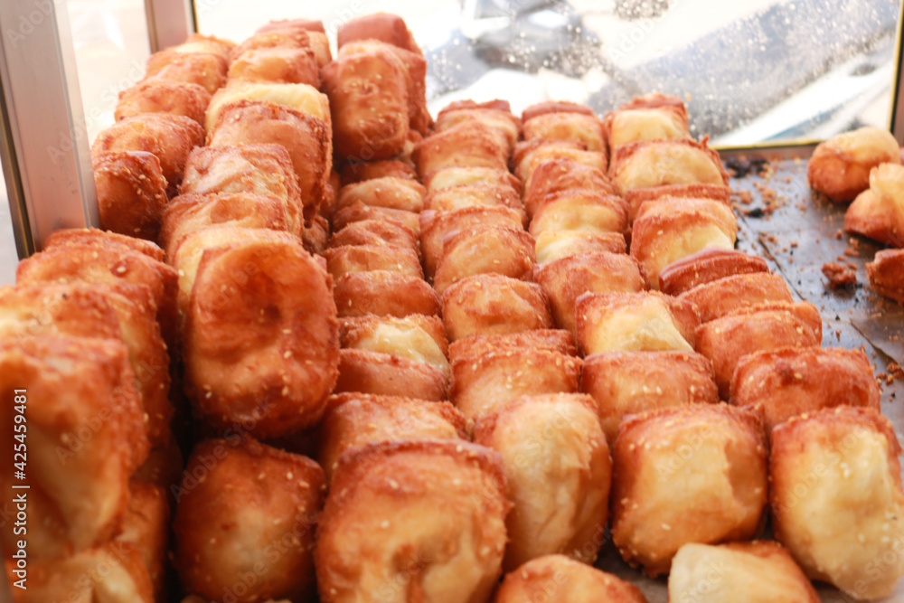 Bolang-baling is fried bread made from wheat flour with good taste, generally sold on the side of the road.
