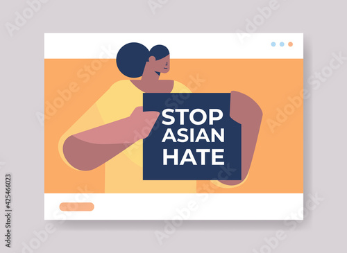 woman holding text banner against bullying and racism stop asian hate support during covid-19 coronavirus pandemic