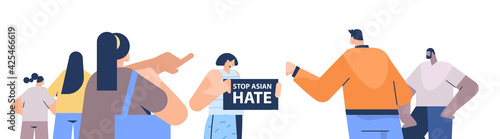 mix race people protesting against bullying and racism stop asian hate support during covid-19 coronavirus pandemic