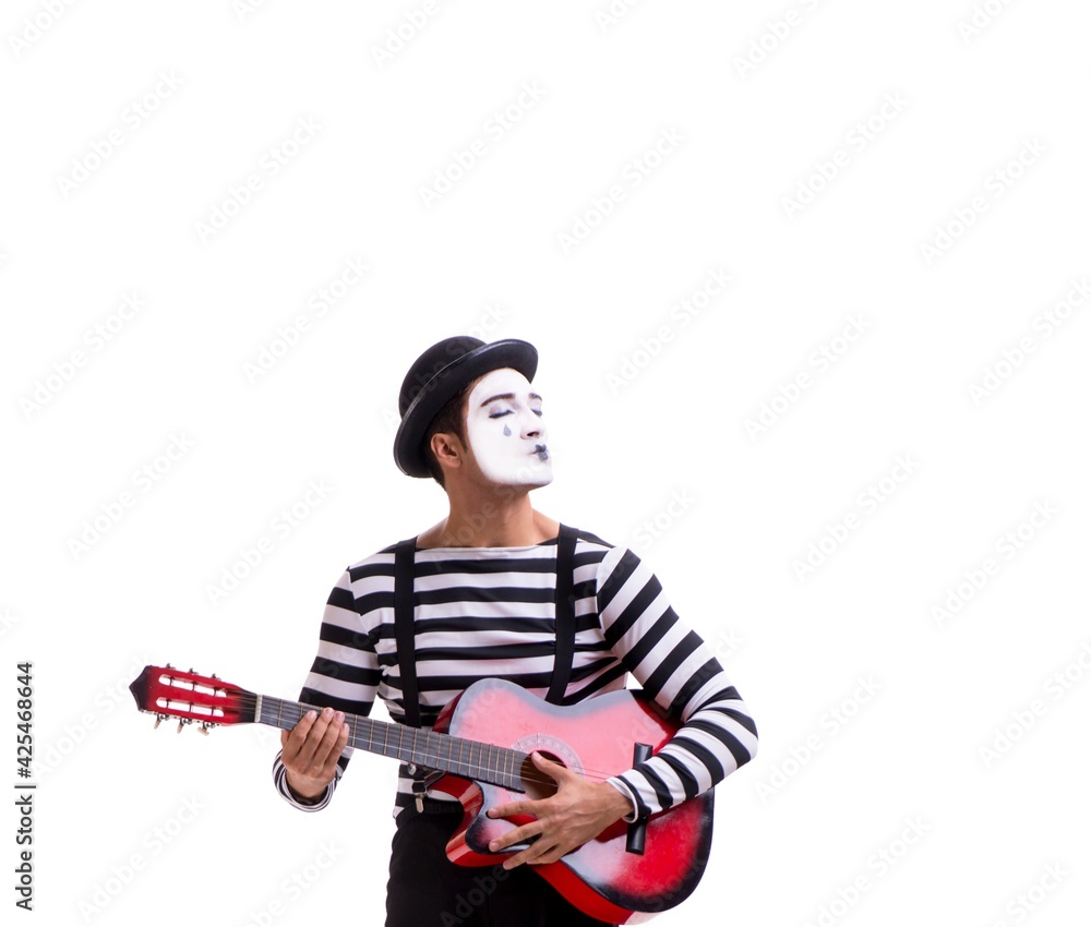 Mime playing guitar isolated on white Mime playing guitar isolated on white