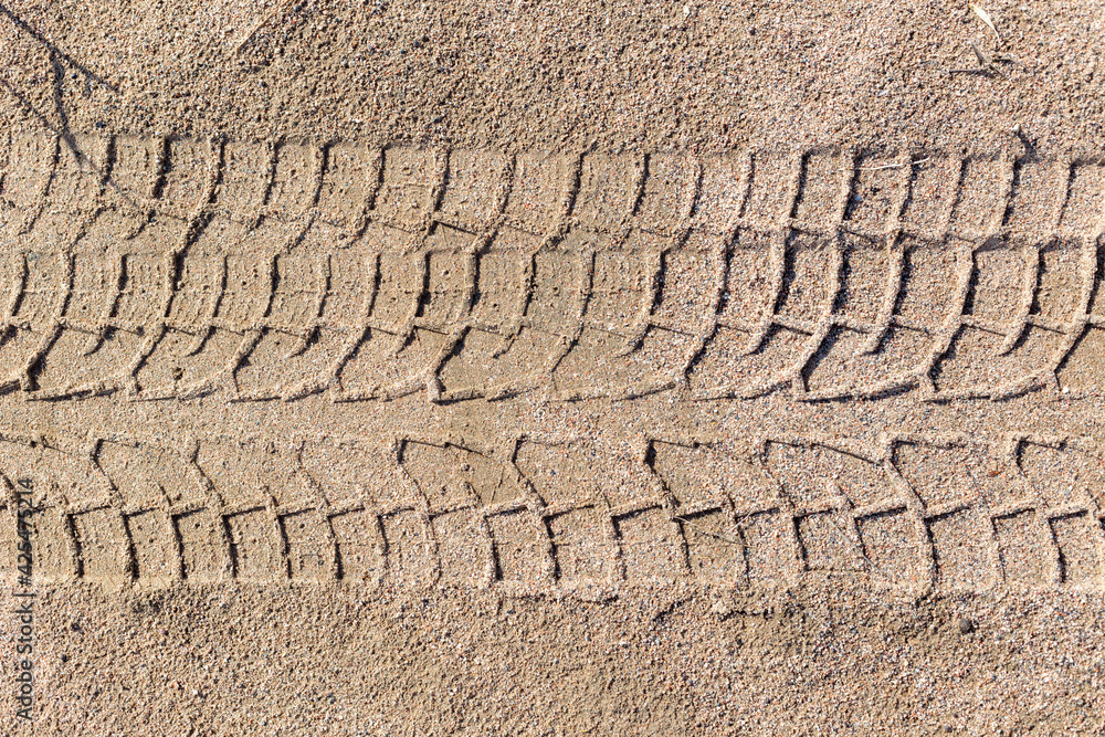 Abstract background - the wheel tracks in the sand. Abstract background - the wheel tracks in the sand.