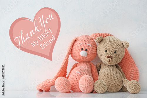 Cuddly toys on white backgr...