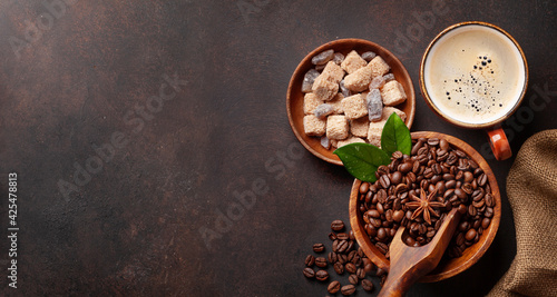 Roasted coffee beans and espresso cup