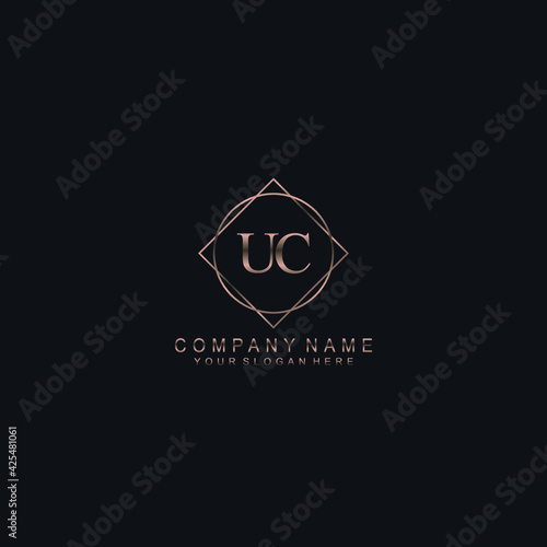 UC Initials handwritten minimalistic logo template vector © saturnus