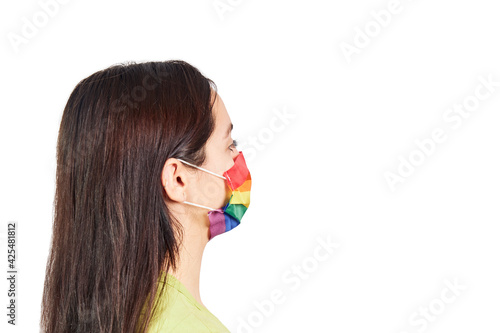 Portrait woman wearing gay pride mask symbol of Lgbtq social movement