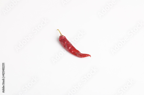dry red chilly on white background.