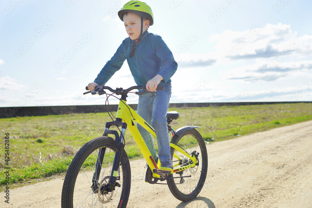 Fototapeta premium person riding a bike