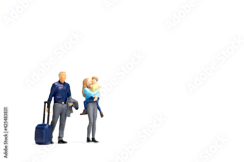 Miniature people Happy family standing on white background