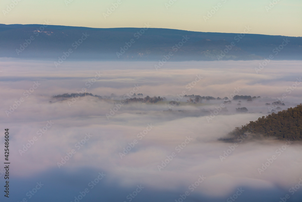 Fog in the Megalong Valley in The Blue Mountains in Australia Fog in the Megalong Valley in The Blue Mountains in Australia