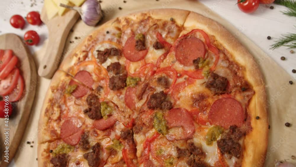 Italian Pizza Surrounded by Fresh Foods Italian Pizza Surrounded by Fresh Foods