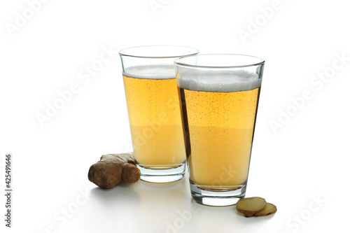 Glasses of ginger beer isolated on white