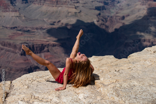 Sex woman on canyon. Orgasm nature landscape. Crazy girl concept. photo
