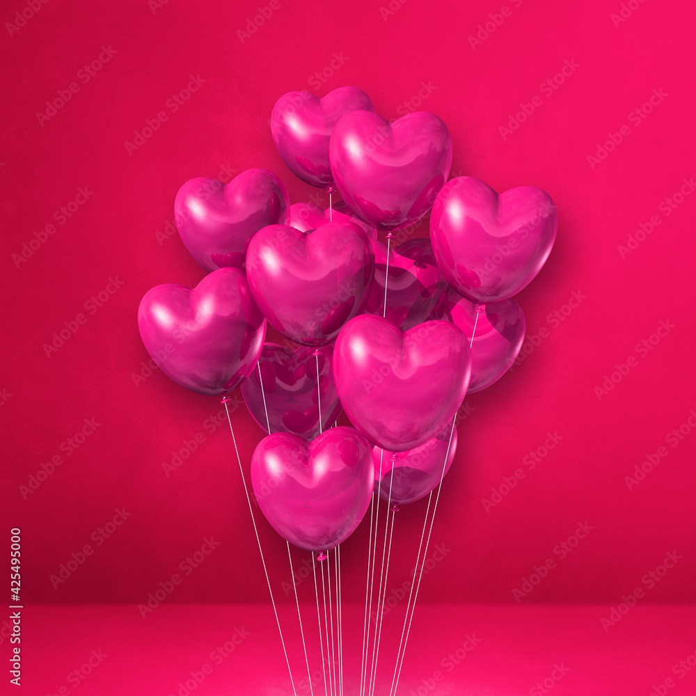 Heart shape balloons bunch on a pink wall background