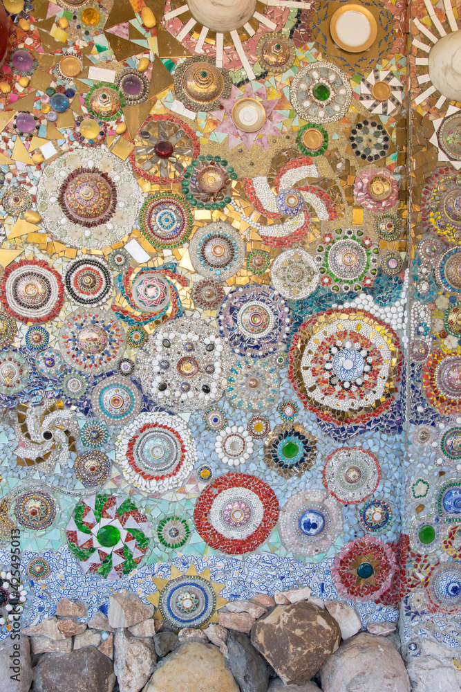 Wall sculptures are collages made from fragments of tiles. Is contemporary art