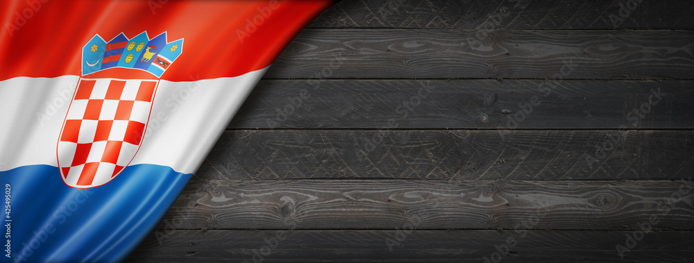 Fototapeta premium Croatian flag on black wood wall banner