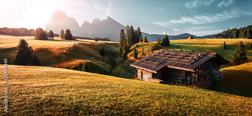Fantastic sunny morning scene. Wonderful picturesque scenery in the Dolomites Alps. Alpe di Siusi. Travel adventure concept. Concept of ideal resting place of outdoor. Picture of wild nature