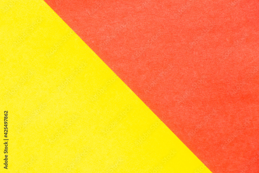 Abstract red and yellow color paper textured background with copy space for design and decoration Abstract red and yellow color paper textured background with copy space for design and decoration