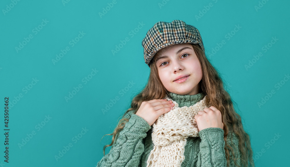 cheerful kid girl in beret and knitwear, copy space, fashion cheerful kid girl in beret and knitwear, copy space, fashion