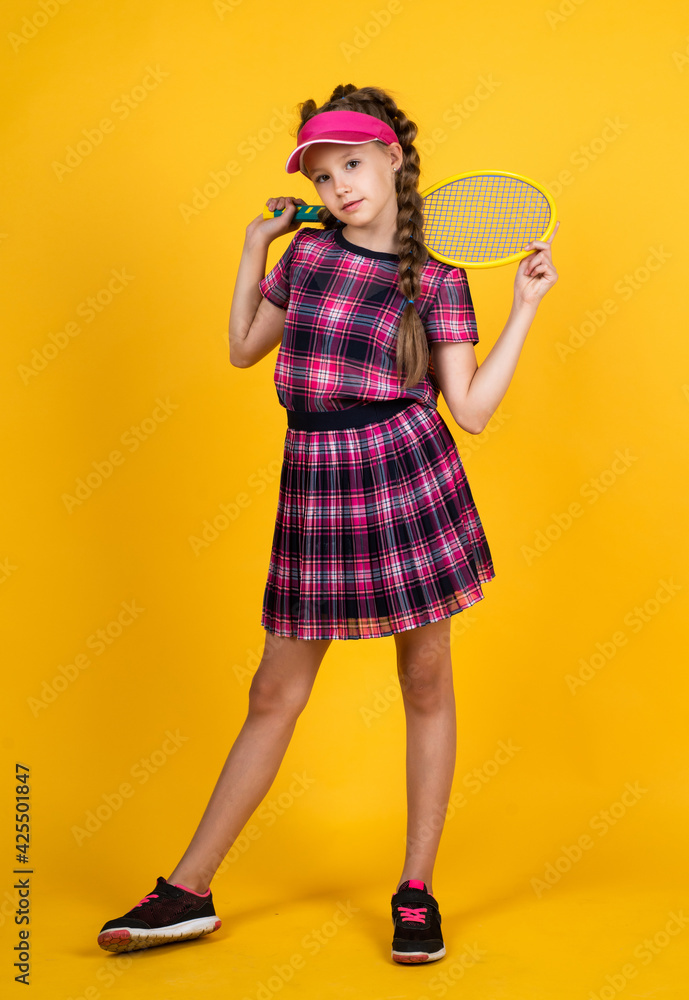 no pain no gain. happy childhood. kid in cap hold racket. child with racquet. girl do sport training. dedicated to fitness. tennis or badminton player. healthy and active lifestyle. full of energy no pain no gain. happy childhood. kid in cap hold racket. child with racquet. girl do sport training. dedicated to fitness. tennis or badminton player. healthy and active lifestyle. full of energy