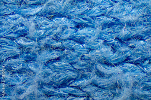 Macro Abstract of Blue Soft Fleece Textile - Knitted Fiber Mesh and Fluffy Fabric Surface Background