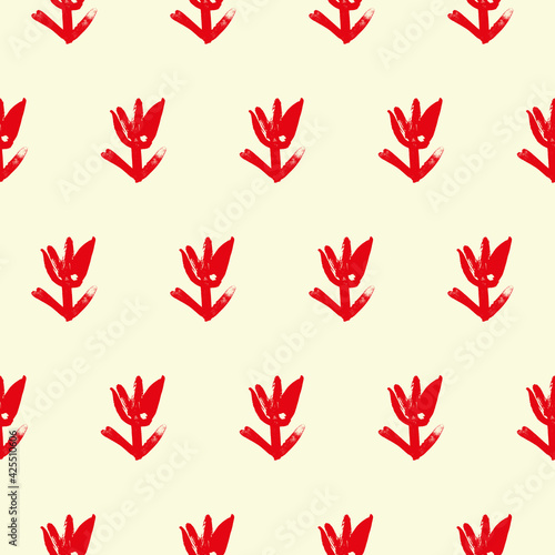 Fototapeta Naklejka Na Ścianę i Meble -  Seamless pattern of tulips. Floral pattern. A hand-drawn pattern of cute red tulips in a doodle style on a light yellow background. Trendy simple repetitive vintage texture. For fabric, print, wrap.