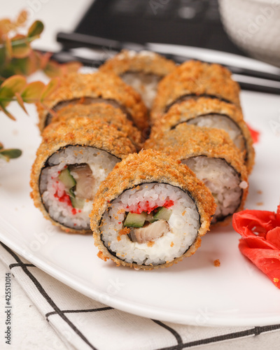 Different rolls and sushi. Asian cuisine.