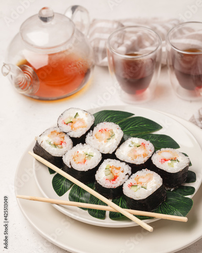 Different rolls and sushi. Asian cuisine.