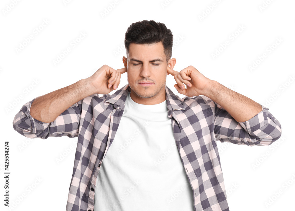 Man covering ears with fingers on white background Man covering ears with fingers on white background