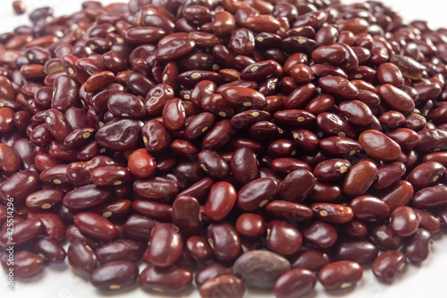 Fresh organic red kidney beans or rajma on white isolated background.
