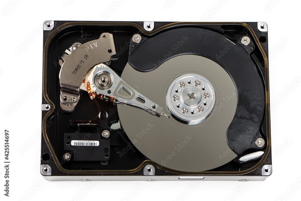 Close up inside of computer hard disk drive HDD isolated on white background Close up inside of computer hard disk drive HDD isolated on white background