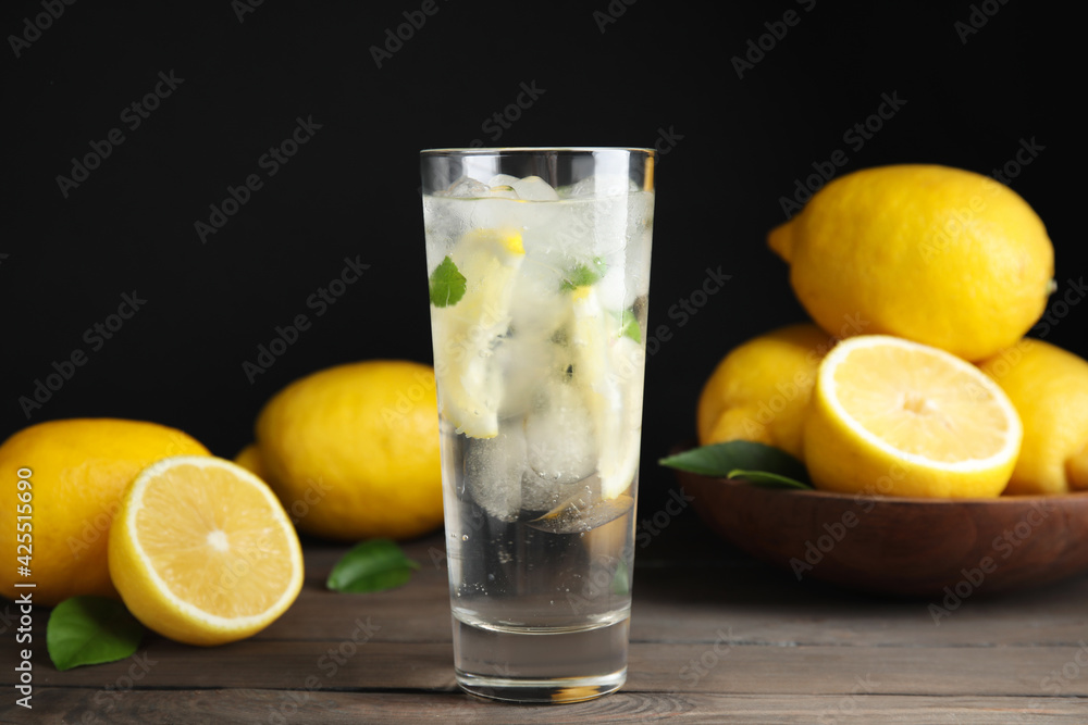Cool freshly made lemonade and fruits on wooden table Cool freshly made lemonade and fruits on wooden table