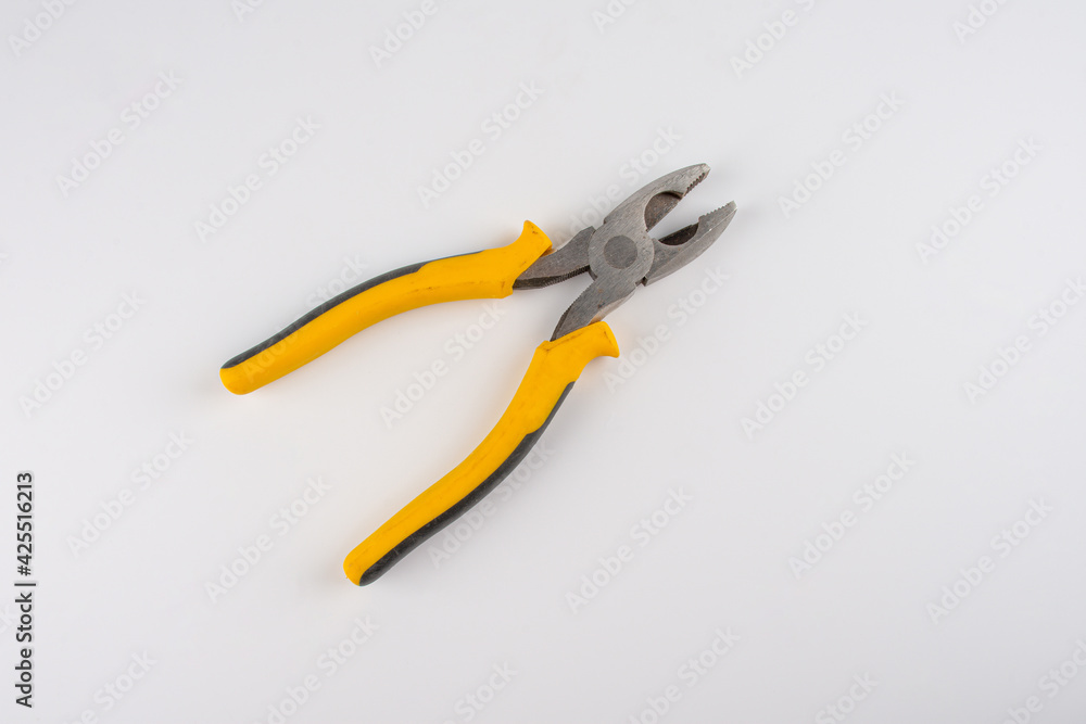 yellow pliers isolated on white background yellow pliers isolated on white background
