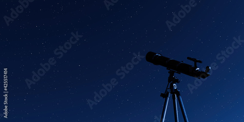 telescope on tripod with a starry sky