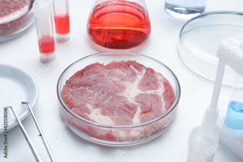 Sample of cultured meat on white lab table