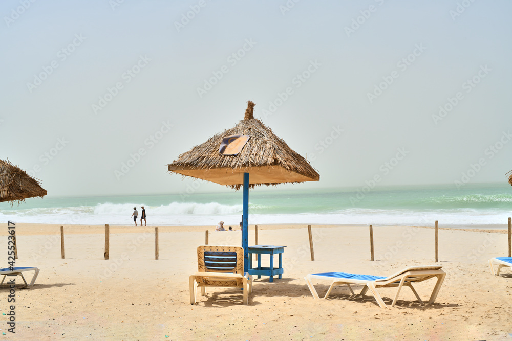 beach chairs and umbrella on the beach