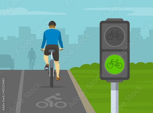 Back view of cyclist cycling on bike path. City road with dedicated bicycle lane and traffic signal. Close up view. Flat vector illustration template.