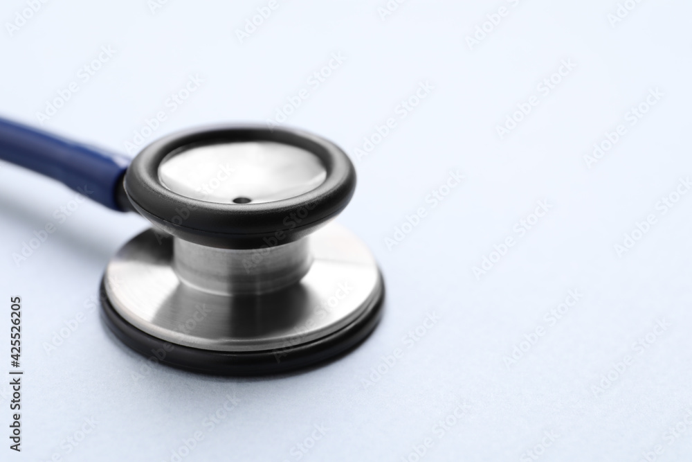 Stethoscope on white background, closeup. Space for text Stethoscope on white background, closeup. Space for text