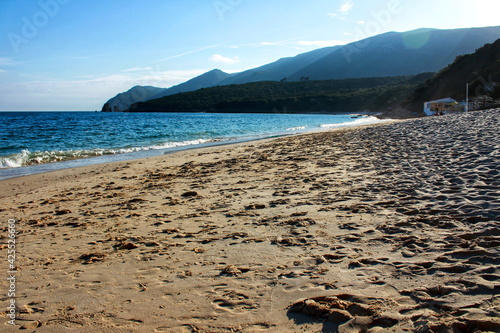 Crystalline waters and rock textures of Galapinhos Beach photo