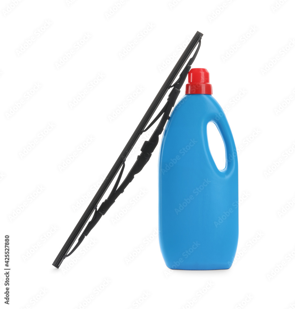 Fototapeta premium Bottle of windshield washer fluid and wiper on white background
