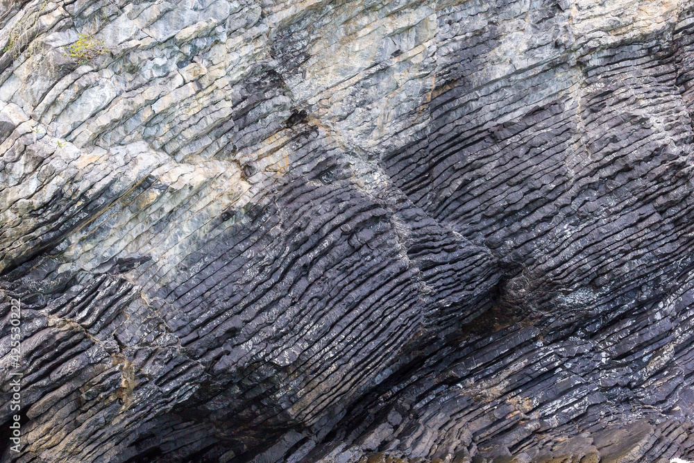 Granite cliff has many shades(black, grey, white), it is a beautiful natural theme. Granite cliff has many shades(black, grey, white), it is a beautiful natural theme.