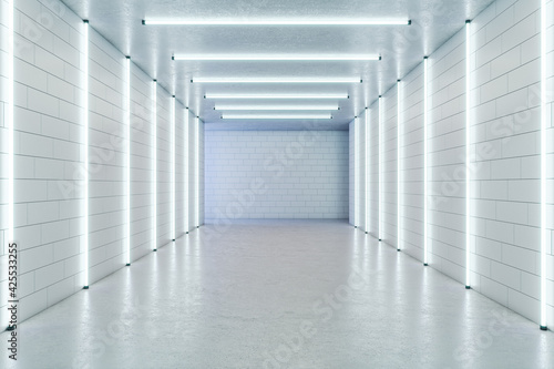 Empty long white gallery with fluorescent lights and a blank white wall in the background  concrete floor and brick walls  interior design and showroom concept. 3d rendering  mock up