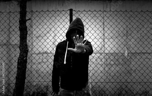 Photography Young street gang with mask