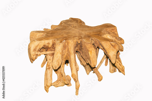 table made from the root of a tree on white background. Interior element